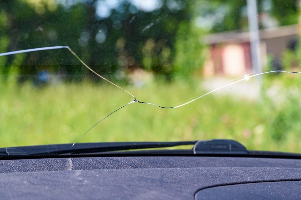 Close-up of damaged car windscreen needing repair