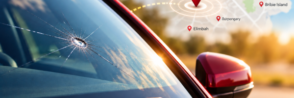 Close-up of a cracked car windscreen with a star-shaped impact, illustrating auto glass repair and replacement services in Caboolture